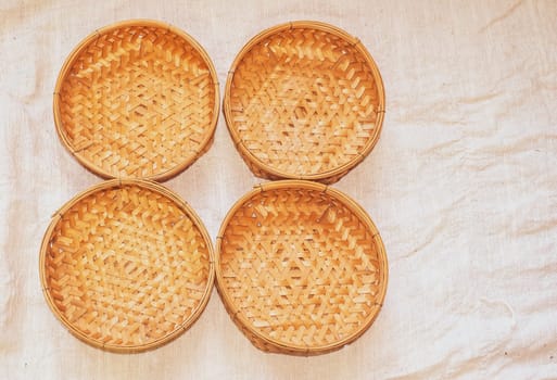 Set of Empty wicker basket on the table with a background in natural linen, Template mock up for display of product