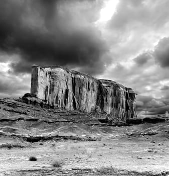 Monument Valley Arizona with stormy cloudy skies black and white