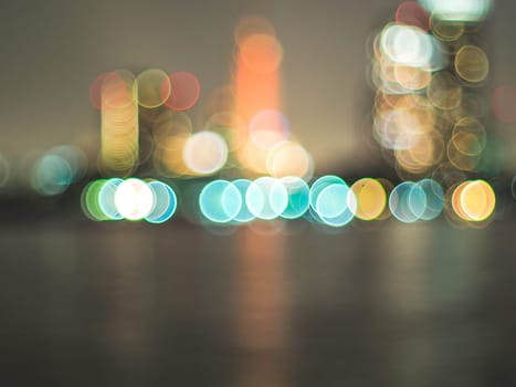 Bokeh city lights background. Bokeh of cityscape skyline during evening dark blue sunset, dusk twilight