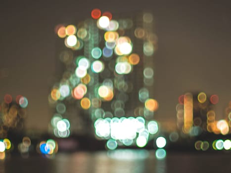 Bokeh city lights background. Bokeh of cityscape skyline during evening dark blue sunset, dusk twilight