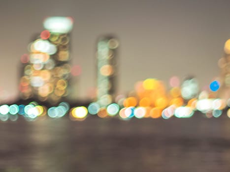 Bokeh city lights background. Bokeh of cityscape skyline during evening dark blue sunset, dusk twilight