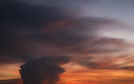 Giant dark cloud. Storm Clouds at Sunset abstract weather season.