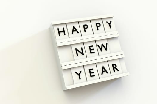 3d illustration. Happy New Year Text Light Box on background . Copy Space For Message.
