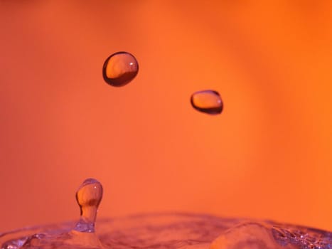 Abstract Colors colliding drops different fluids funds forms