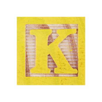 A Letter K childs wood block on white with clipping path