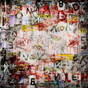 Grunge textured background with old torn newspapers