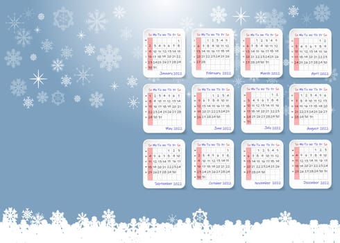 2022 table calendar in a snowy winter landscape. Week starts on Sunday.