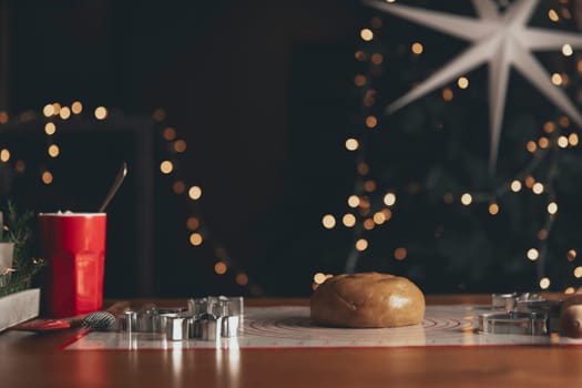 Merry Christmas, Happy New Year. Gingerbread cooking, cake or strudel baking. Preparing cookies. Kneaded dough and forms on the table. Prepare, bake, cook homemade sweet desserts. High quality photo