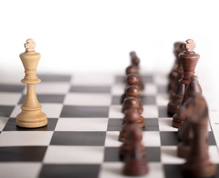 The Chess pieces on a chessboard. The concept of playing and winning a chess tournament