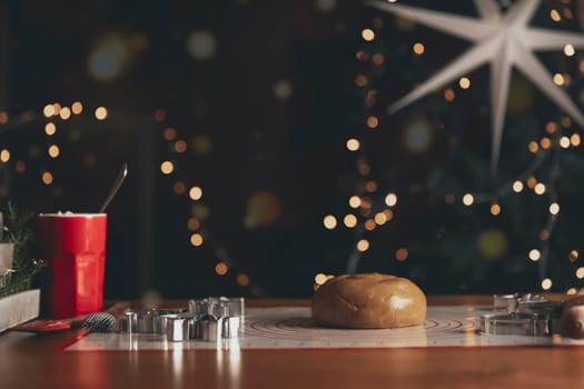 Merry Christmas, Happy New Year. Gingerbread cooking, cake or strudel baking. Preparing cookies. Kneaded dough and forms on the table. Prepare, bake, cook homemade sweet desserts. High quality photo