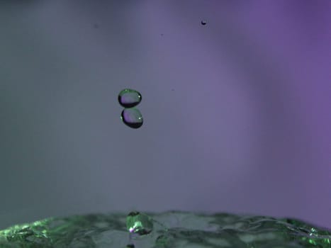 Abstract Colors colliding drops different fluids funds forms