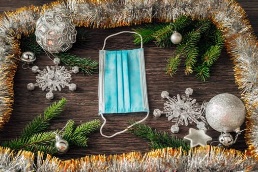 Decoration of Christmas Tree Green Branches on a Brown Background
