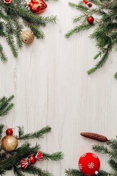 Christmas Composition on a White Wooden Table with Copy Space Text