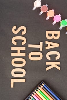 Back to school design with color pencils and typography lettering. Education illustration for ideal poster, web, cover, ad, greeting, card, social media, promotion. Vertical Background.
