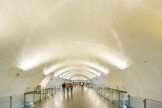 LISBON, PORTUGAL - DEC 27, 2008: people hurry in the old metro station in Lisbon to the train. The metro is one of the oldest in europe.