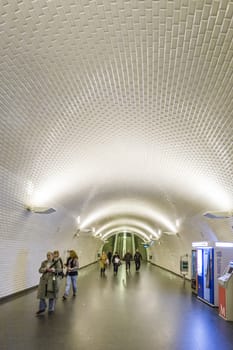LISBON, PORTUGAL - DEC 27, 2008: people hurry in the old metro station in Lisbon to the train. The metro is one of the oldest in europe.