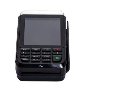 black payment terminal close-up for accepting money from plastic cards from customers on a white isolated background, copy space. High quality photo