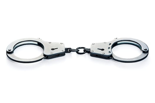 Metal handcuffs on a white isolated background. High quality photo