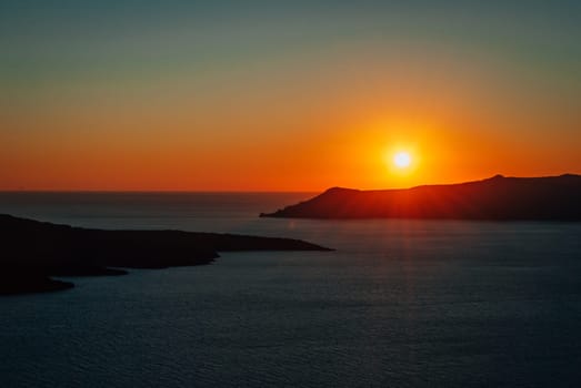 Sunset over the caldera on the island of Santorini, Greece.