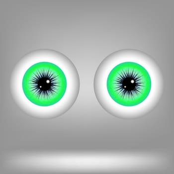 Green Eyes Isolated on Grey Background. Part of Human Face.