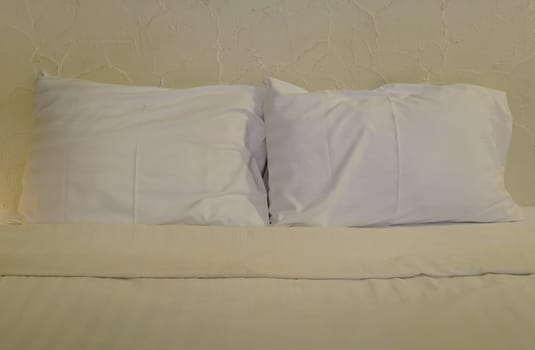 White pillows on bed