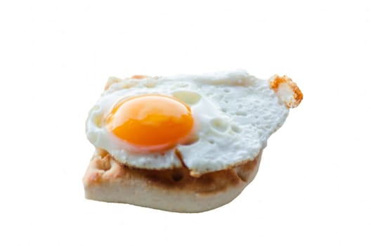 Quail egg as a fried egg on a small toast.