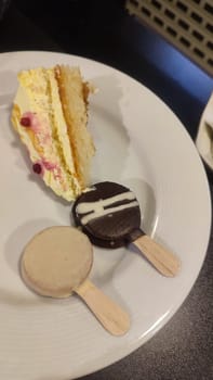 sweet cakes with cream, desserts desserts food white plate kitchen tasty cooking cafe restaurant breakfast morning ice cream. High quality photo vertical format image