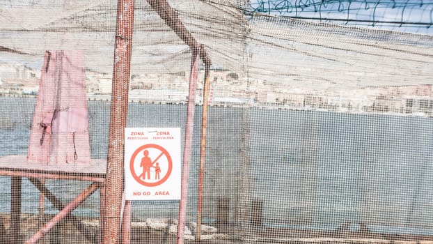 No go area. area enclosed by a wire mesh