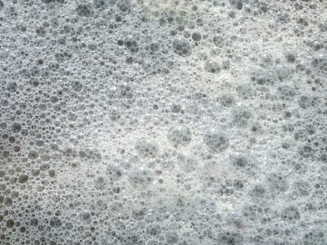Foam made by the wave on the beach