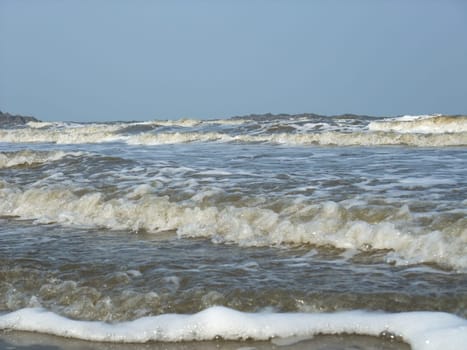 Foam made by the wave on the beach