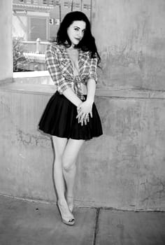 A lovely model female model posing outdoors