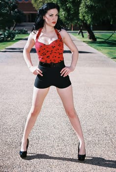 A lovely model female model posing outdoors