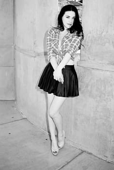 A lovely model female model posing outdoors