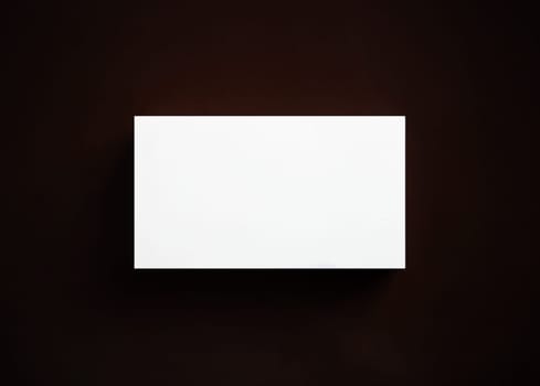 Photo of blank business card. Branding ID template. Top view. Flat lay.