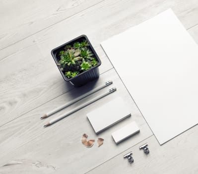 Blank stationery template on light wooden background. Mock-up for branding identity. For design presentations and portfolios.
