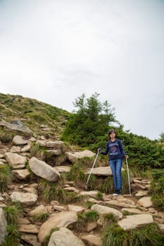 Girl Descend Down a Large Green Mountain Range.