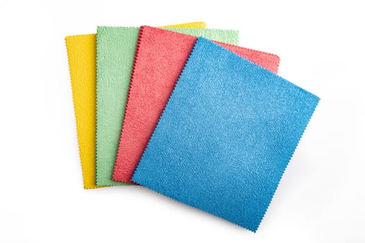 Stack of colored microfiber cloth isolated on white