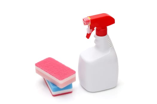 Spray plastic bottle and cleaning sponge on a white background