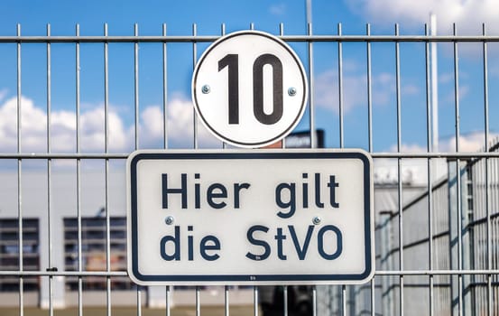 The road traffic regulations apply here sign shows 10 kilometers per hour.