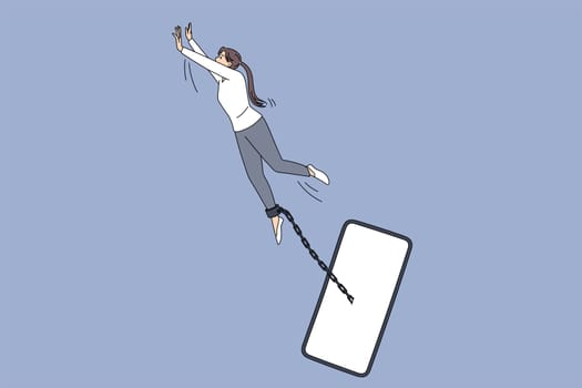 Addiction to internet and gadgets concept. Young woman trying to fly away from smartphone connected with chain on leg like slave vector illustration