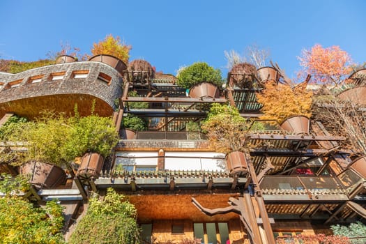 Turin, Italy - Circa November 2021: real estate green residential building. Exterior with modern design, plants and wood integrated. This Treehouse Suite is named 25 Verde