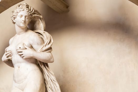 Florence, Italy - circa July 2021. Sensual naked woman statue. Beauty figure made of stone.