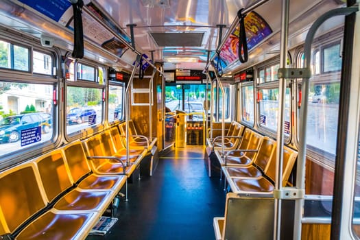 SAN FRANCISCO, USA - JULY 24: public Bus without passengers stopps at busstop on July, 24,2008, San Francisco, USA. .The median income of a Bus driver is 23,588 USD in the year 2013.