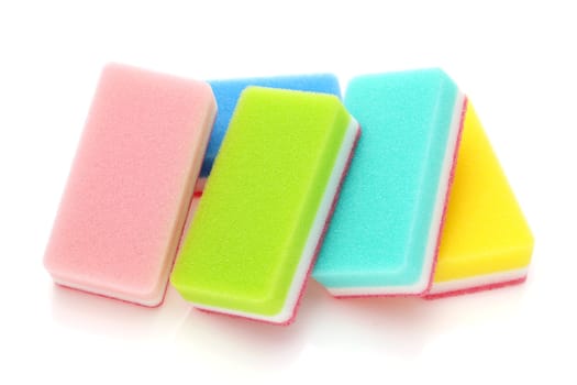 color rectangular sponges for washing dishes and cleaning in kitchen on white background