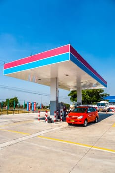 BANGKOK, THAILAND - DEC 25, 2009: petrol station at the highway near Bangkok, Thailand. Fuel prizes in Thailand are nearly the same like in Germany.