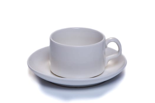 white coffee cup with saucer on white isolated background. High quality photo