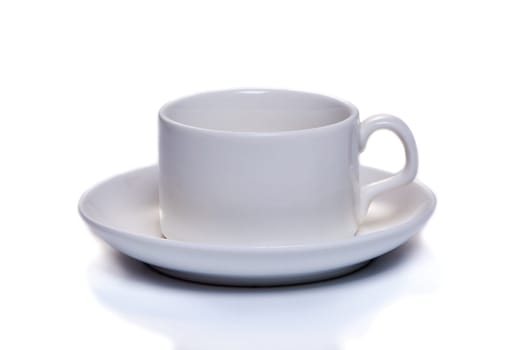 white coffee cup with saucer on white isolated background. High quality photo