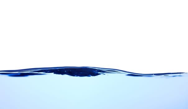 Light blue water wave with air bubbles and a little bit splashed underwater, studio shot isolated on white background. The abstract clean surface on liquid