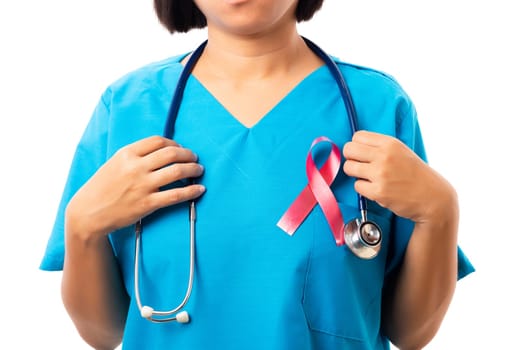Woman nurse in clinic uniform with support HIV AIDS awareness red ribbon on the chest in studio shot isolated on over white background, Healthcare and medicine, World aids day concept