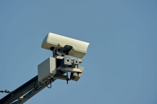 a video recording camera of violations is hanging on a pole. High quality photo